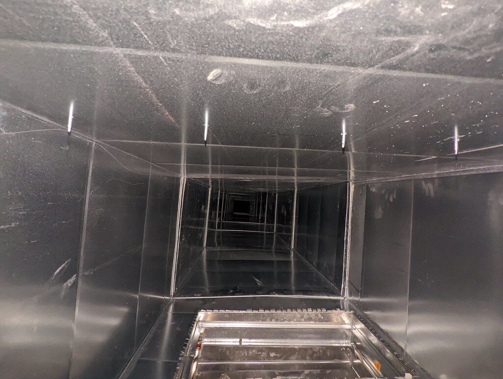 Looking down the inside of a clean metal air duct