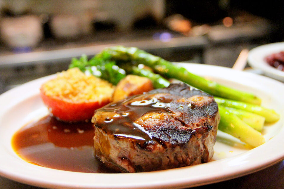 Steak with vegetables and pan sauce